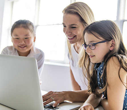 teacher with student completing an aas practice test